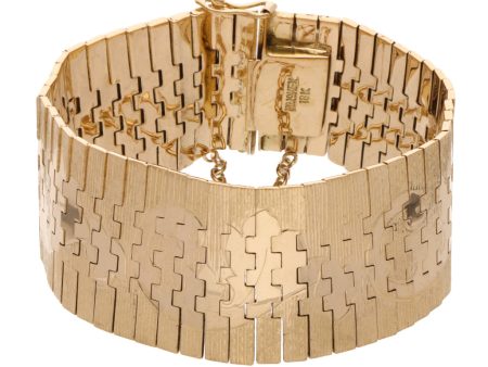 Brazalete eslabón articulado cepillado en oro amarillo 18 kilates. Online