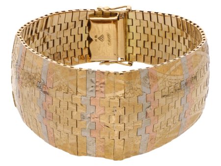 Brazalete eslabón articulado labrado en oro tres tonos 18 kilates. Online now