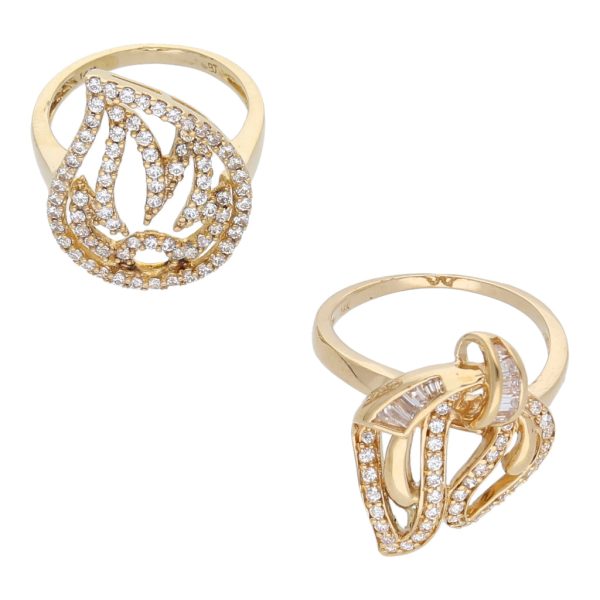 Dos anillos estilizados con circonias en oro amarillo 14 kilates. Online now